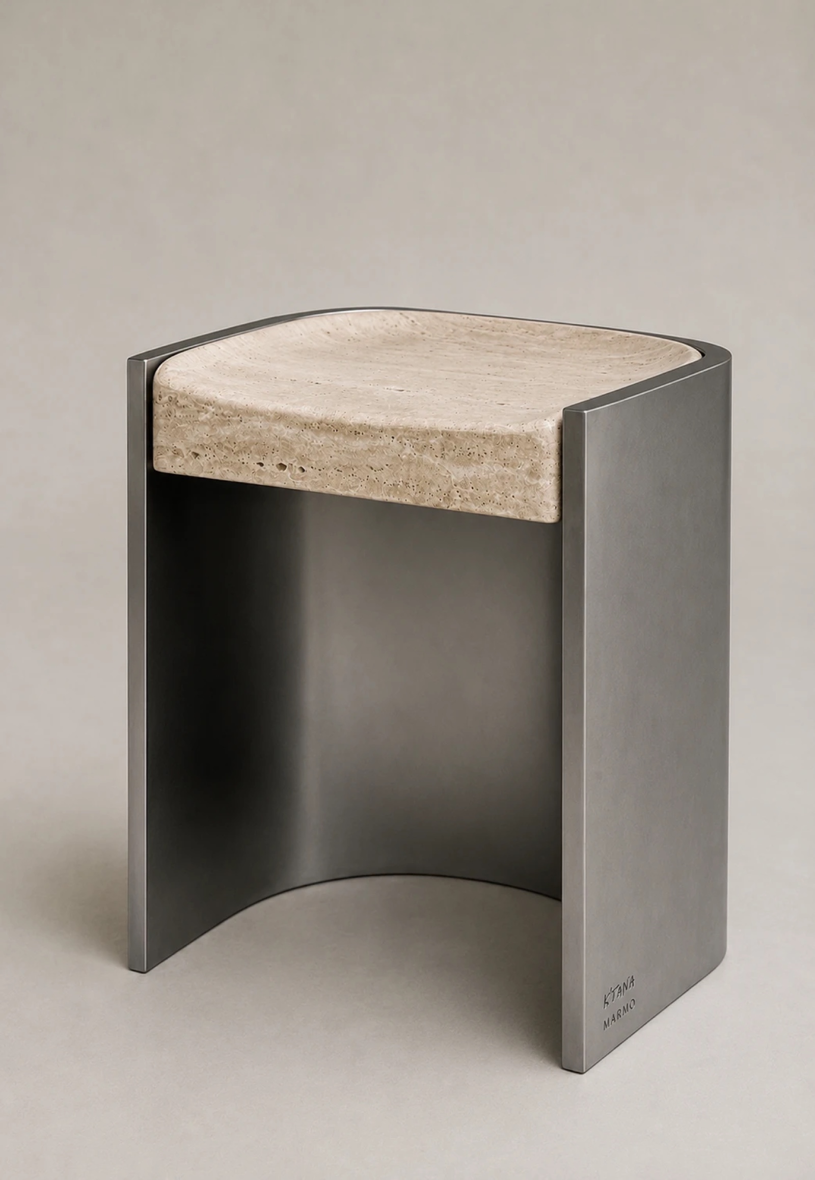 Trav Stool — travertine seat on a curved steel frame